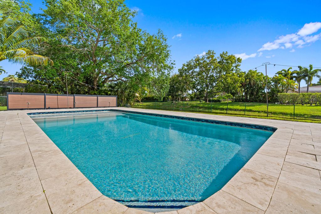 Photo of 10027 Ramblewood Drive, Coral Springs, FL 33071 (MLS # B26013029)