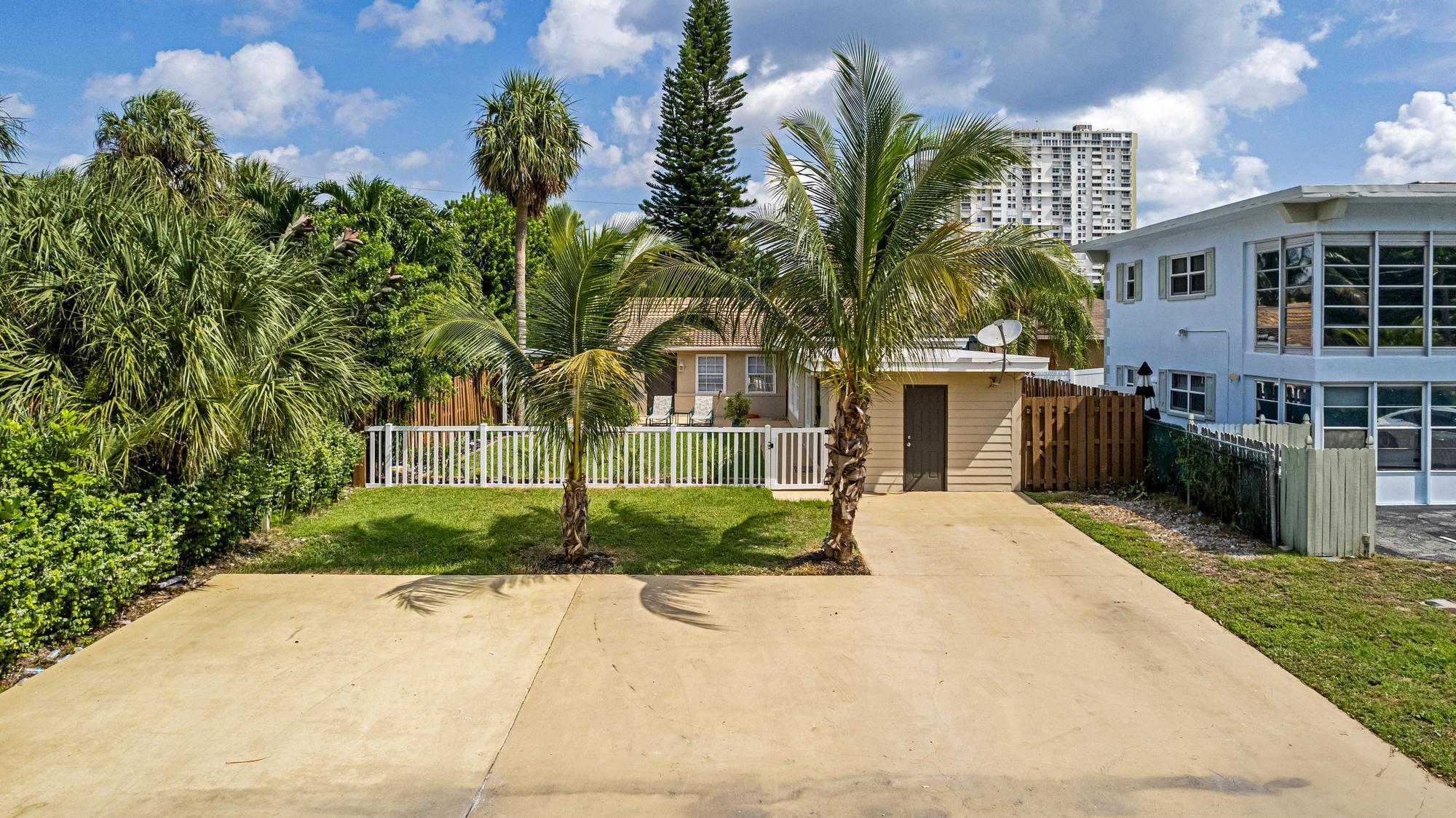Discover your dream investment with this fully renovated multi-family gem in vibrant Pompano Beach! A new conversion just completed, this property offers two stylish units plus a bonus efficiency, each with brand-new kitchens featuring granite counters and stainless steel appliances. Upgrades include impact windows/doors, new electric, and Smart Home technology for modern living. Enjoy a private fenced yard, boat parking, and the freedom of no HOA. Just one block to the beach entrance and steps from trendy dining, bars, and shops, this prime location delivers the ultimate coastal lifestyle. Perfect for savvy investors or owner-occupants seeking income potential, this property offers endless opportunity in one of South Florida's fastest-growing markets.