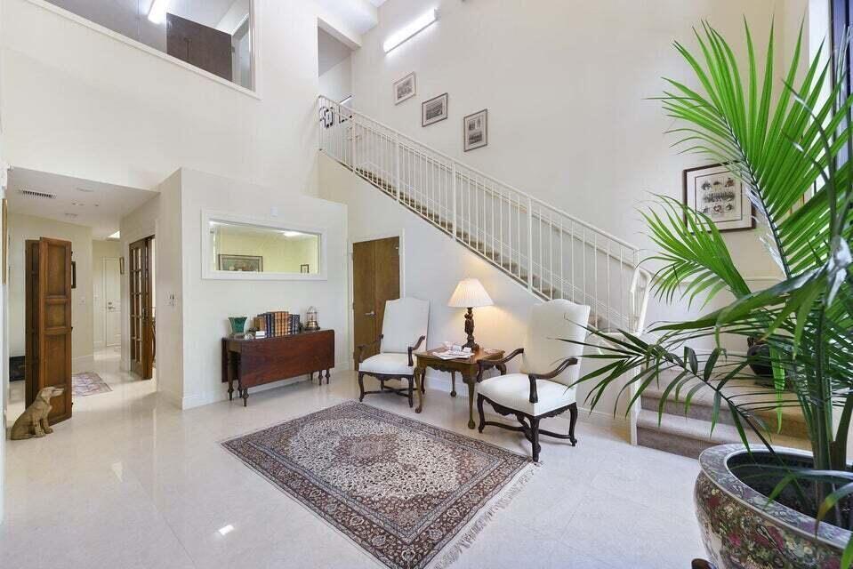 RARE INVESTMENT OPPORTUNITY in Downtown West Palm Beach. Outstanding Live/Work condominium in exciting Two City Plaza. this ground floor unit is in immaculate condition, with both private street and lobby entrances ideal for commercial and/or residential use. The first floor contains a downstairs entry foyer, large waiting room, large conference room, two offices, kitchen, laundry room and half-bath with handicapped access. The second floor loft contains a waiting room, large executive office with views of the downstairs waiting room and street, full bath and a walk-in closet. The unit has independent central heating and cooling and comes with a private underground parking space. Building: built 2008, superbly managed with exceptional staff, 24-hour security,