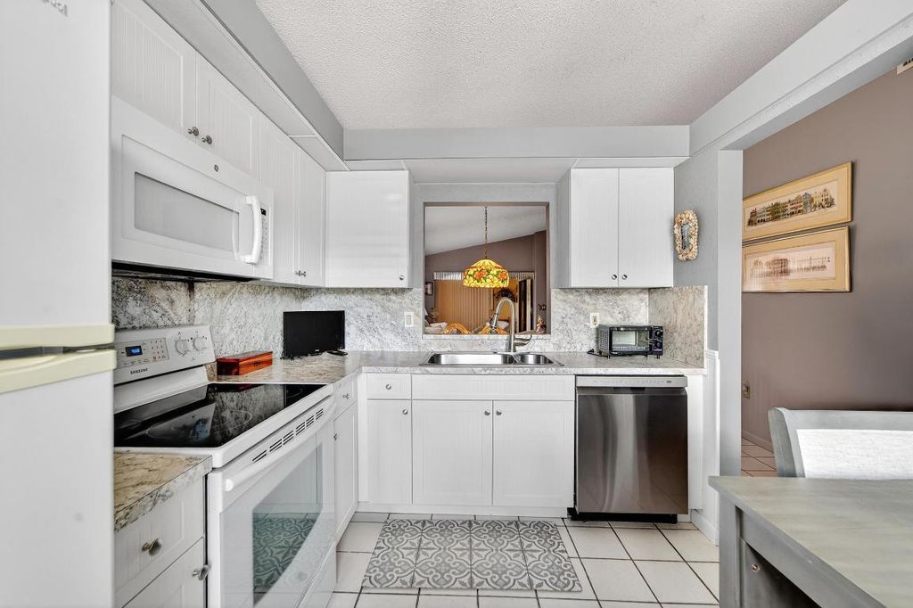 Photo of 6215 Kings Gate Circle, Delray Beach, FL 33484 (MLS # R11144572)