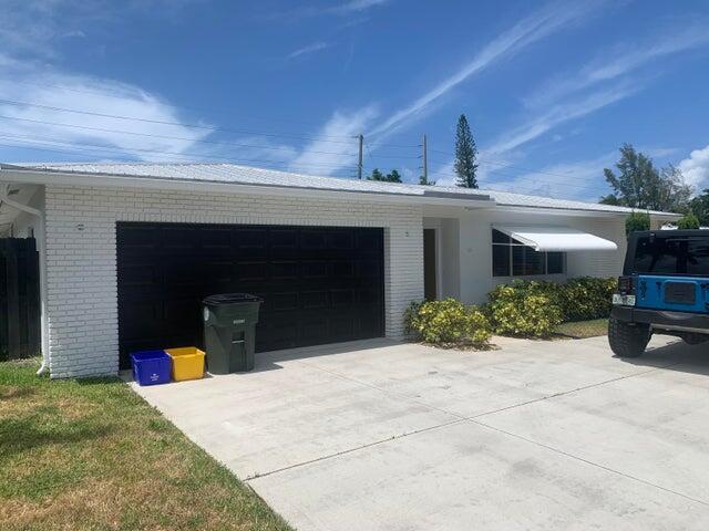 Photo of 511 NW 50th Place, Boca Raton, FL 33431 (MLS # B26012166)