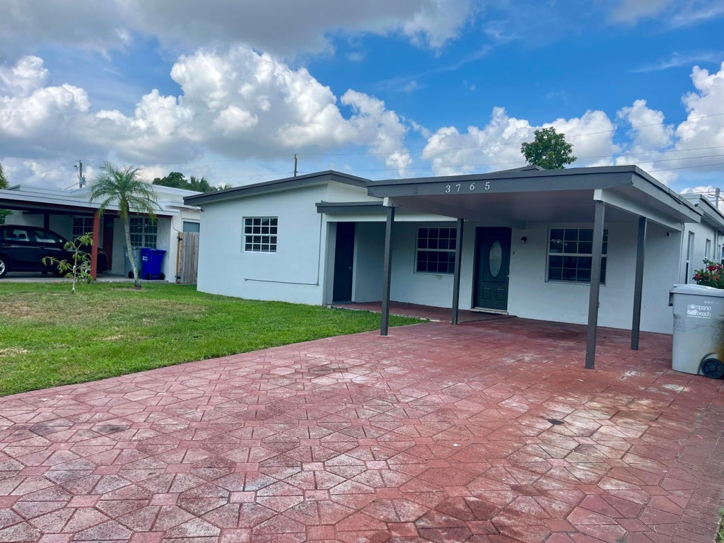Photo of 3765 NE 18th Avenue, Pompano Beach, FL 33064 (MLS # B26076759)