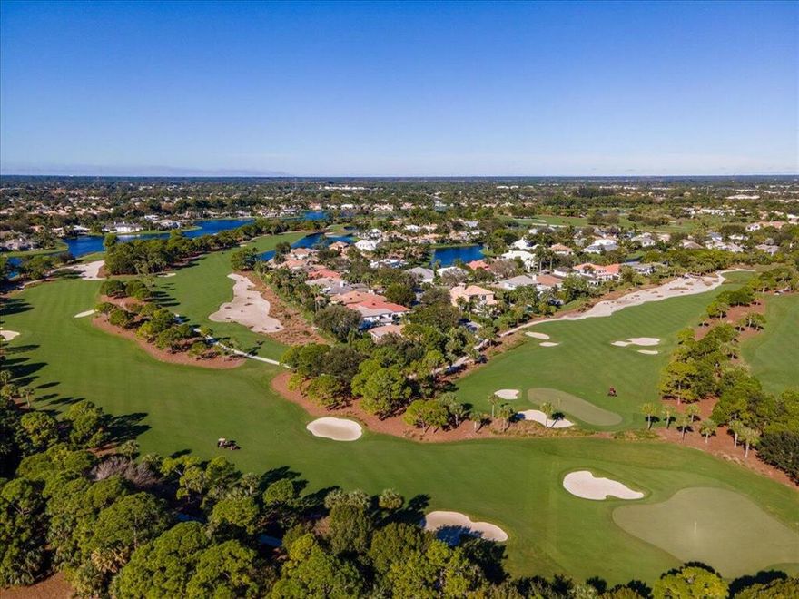 Beautiful golf course views can be found from this Loxahatchee Club home located on a very private 1/3 acre lushly landscaped lot.  This 3787 sf, single level, 4 bedroom, 4 bath home is located on a quiet culdesac.  The pavered driveway leads you to the entry foyer that opens to the large living room and adjoining dining room.  The kitchen offers a center island and an abundance of custom cabinetry, granite countertops and a light filled informal dining space.  Two generous master suites with sitting areas offer walk in closets, spa like baths and access to the outdoors.  Two additional guest bedrooms, one with ensuite bath is perfect for friends or family.  A large light filled room adjacent to the living room is the perfect place for family time.