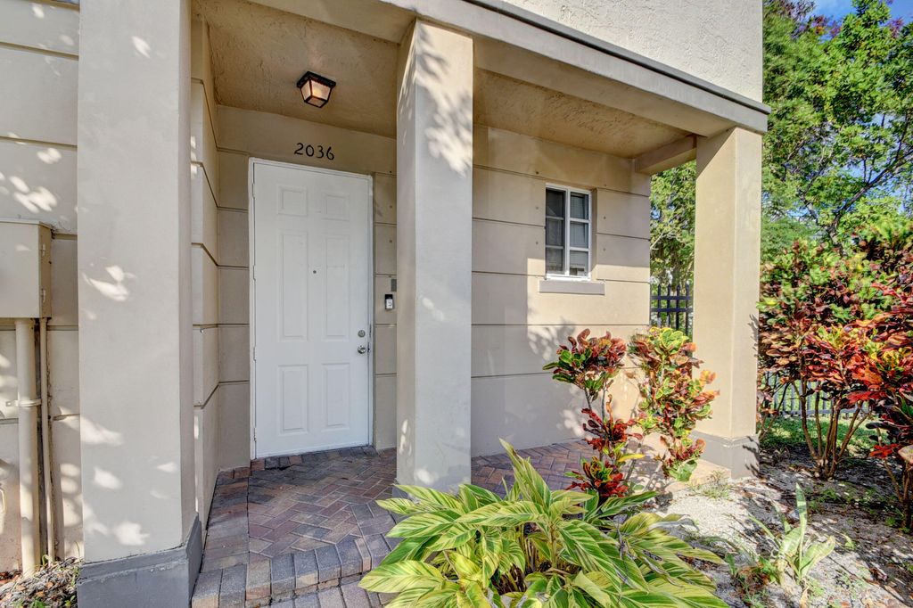 Photo of 2036 Marsh Harbor Drive, West Palm Beach, FL 33404 (MLS # B26028488)