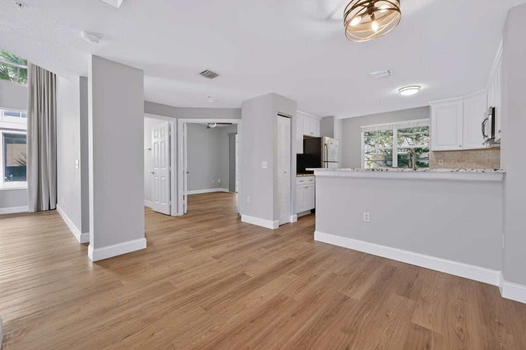 Photo of 4772 CHANCELLOR Drive #24, Jupiter, FL 33458 (MLS # B26089076)