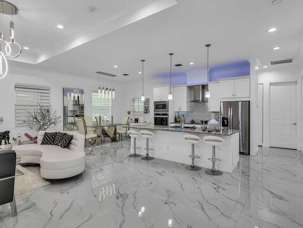 Photo of 2910 SW Sterling Street, Port Saint Lucie, FL 34953 (MLS # B26070724)