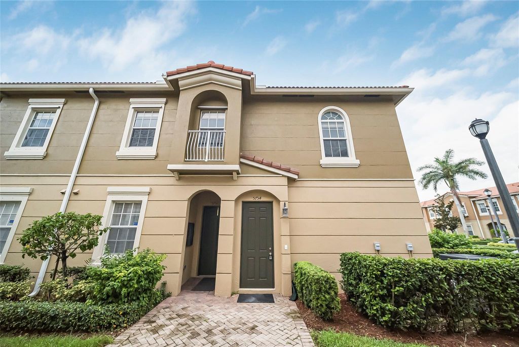 Photo of 5754 HAMPTON HILLS Boulevard #5754, Tamarac, FL 33321 (MLS # B26054863)