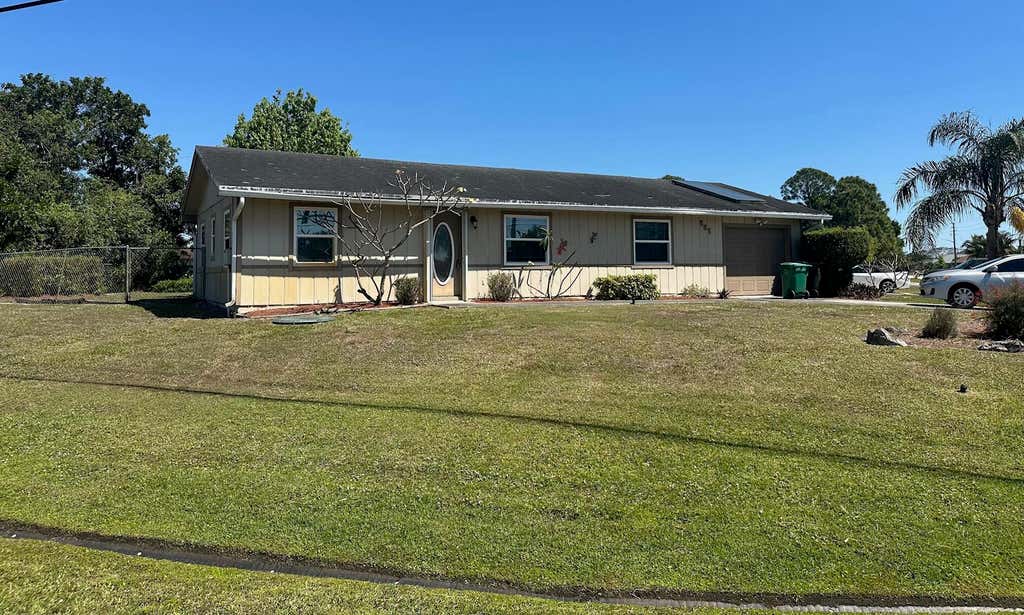 Photo of 885 SW California Boulevard, Port Saint Lucie, FL 34953 (MLS # R11071836)