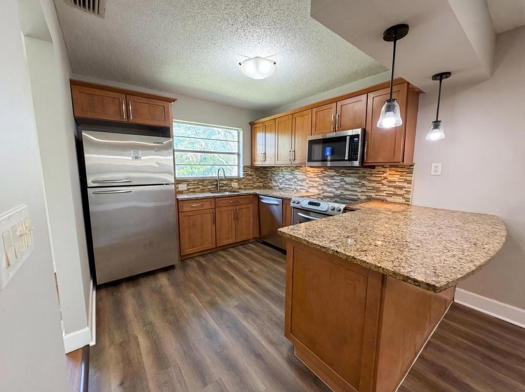 Photo of 9953 NW 1st Court, Coral Springs, FL 33071 (MLS # B26007926)