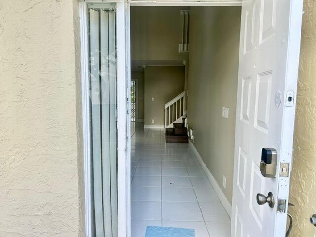 Photo of 9576 NW 8th Circle, Plantation, FL 33324 (MLS # B26029534)