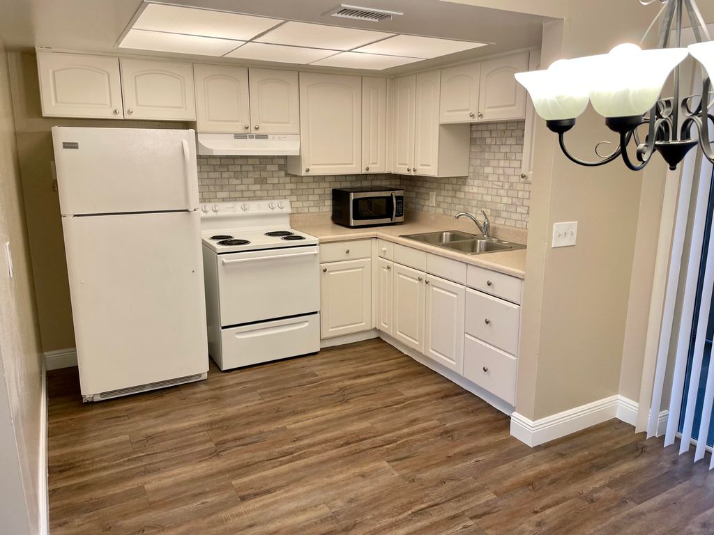 Photo of 3440 Rudolf Road Rd #5, Lake Worth Beach, FL 33461 (MLS # R10795762)