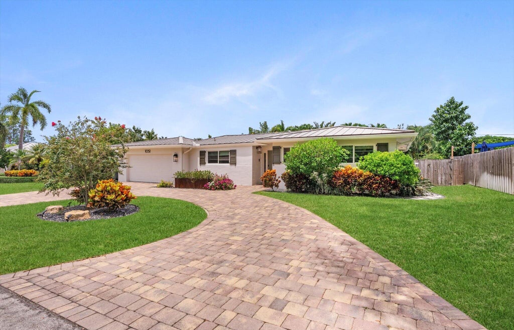 Photo of 1051 NW 3rd Street, Boca Raton, FL 33486 (MLS # B26071328)