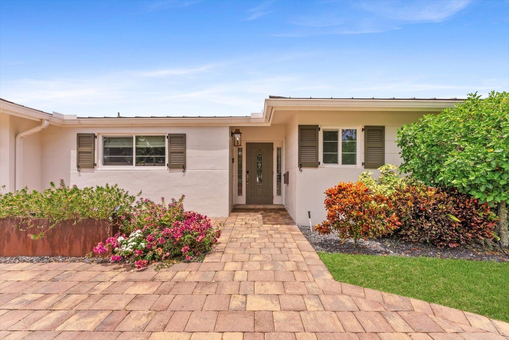 Photo of 1051 NW 3rd Street, Boca Raton, FL 33486 (MLS # B26071328)