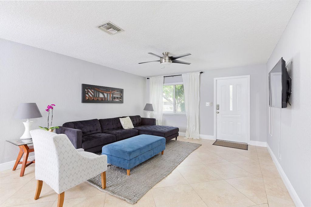 Photo of 4348 NW 2nd Terrace, Boca Raton, FL 33431 (MLS # B26042900)