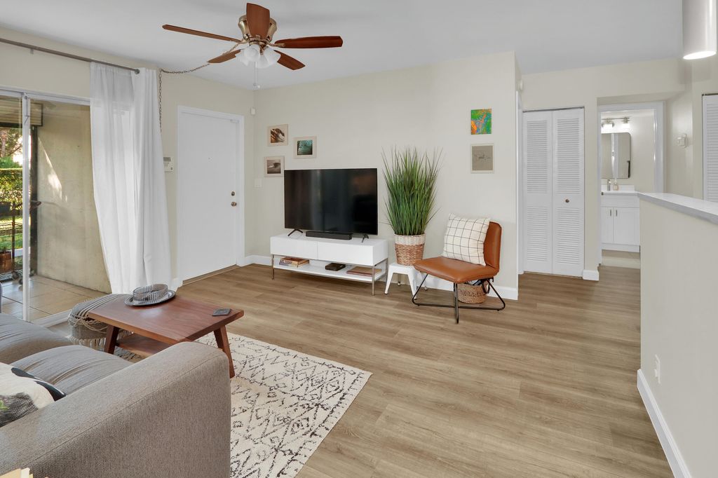 Photo of 6392 Chasewood Drive #D, Jupiter, FL 33458 (MLS # B26024220)