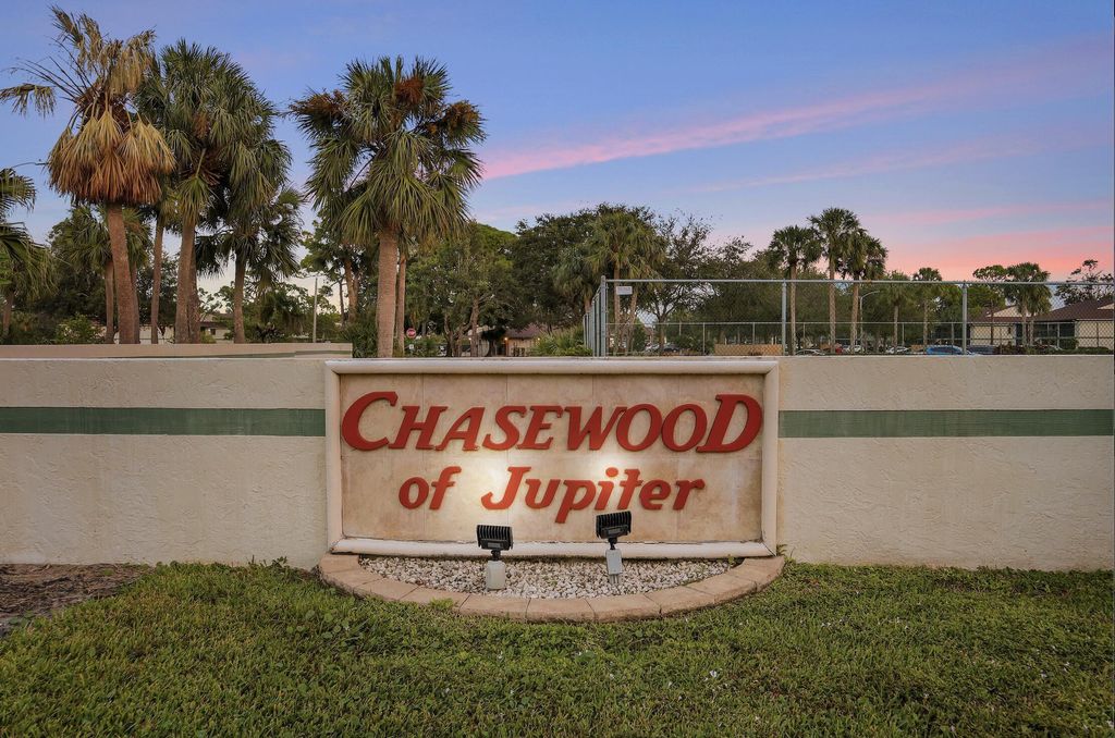 Photo of 6392 Chasewood Drive #D, Jupiter, FL 33458 (MLS # B26024220)