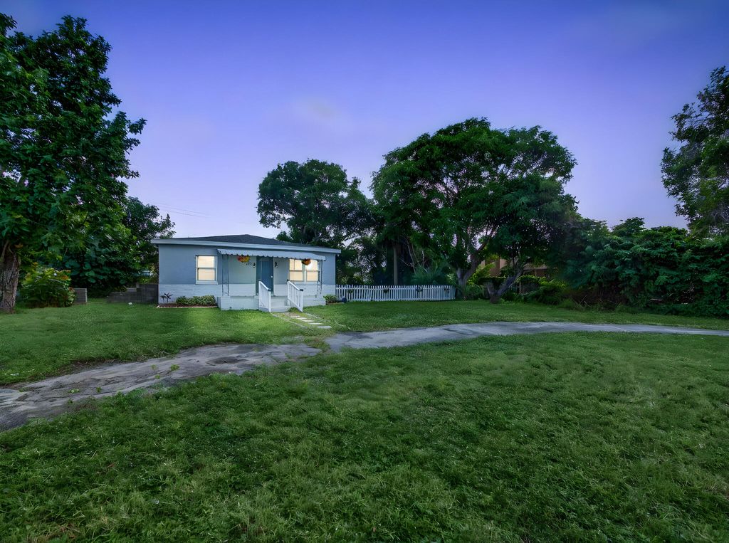 Photo of 1373 W 35th Street, Riviera Beach, FL 33404 (MLS # R11140063)