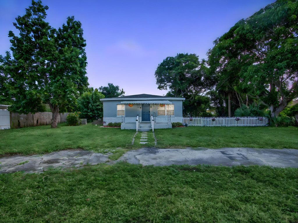 Photo of 1373 W 35th Street, Riviera Beach, FL 33404 (MLS # R11140063)