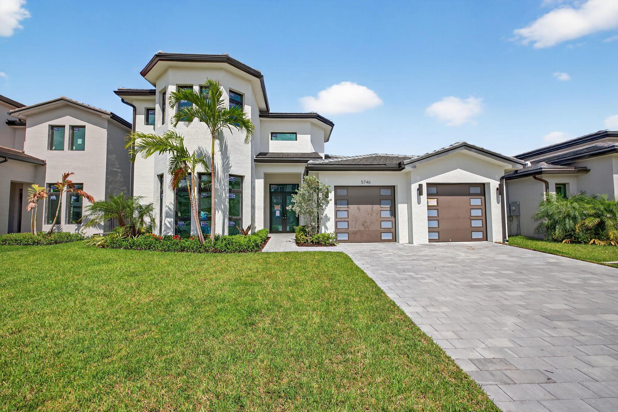 Discover the ultimate of luxury living in the Cypress II Model at The Preserve, a remarkable new construction home featuring 5 bedrooms, 4.5 bathrooms, & a lakefront setting with a stunning pool. The kosher chef's kitchen boasts dual sinks & dishwashers, natural gas stove top & a butler's pantry, all adorned with top-tier Sub-Zero & Wolf appliances. Inside, you'll find imported Italian cabinetry & quartz countertops with exquisite waterfall ends. This gated community is conveniently located near houses of worship, schools, shopping, & FLL Airport. Enjoy the clubhouse with an exercise studio, a 50' community pool, a splash pool, and a tot lot. Hurricane windows & doors provide peace of mind. Expected Completion: End of August 2025 -- don't miss this rare opportunity to own one of the