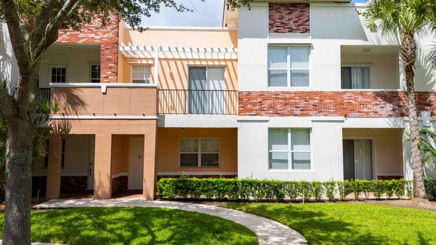 Welcome to the Heart of Tradition!This move-in-ready 2 bedroom, 2 bathroom condo with a bonus room that can be used as a den or dining area offers the perfect blend of convenience and lifestyle. Located on the first floor, this home is directly across from Tradition Town Hall, the community pool, and all the shopping, dining, and entertainment Tradition has to offer. Imagine relaxing by the pool while enjoying live music from the Town Square concerts!Inside, you'll find a comfortable and functional layout with a bright living space, well-appointed kitchen, spacious bedrooms, and the flexible bonus room. The condo also includes a 1-car garage for added convenience.