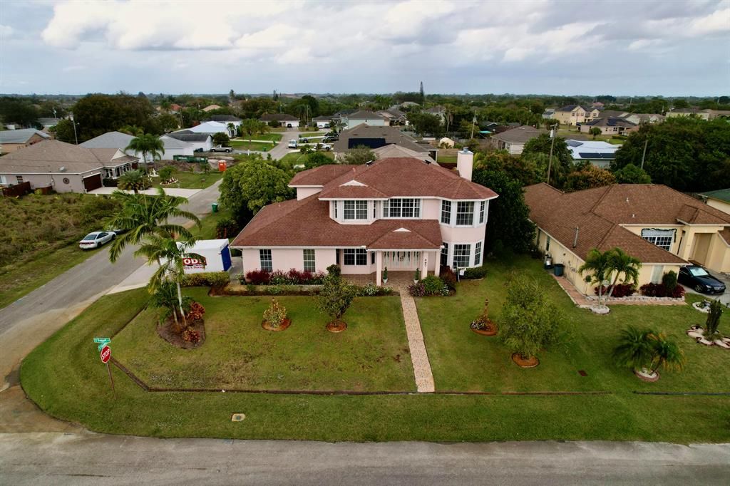Photo of 497 SW Dagget Avenue, Port Saint Lucie, FL 34953 (MLS # R10770436)