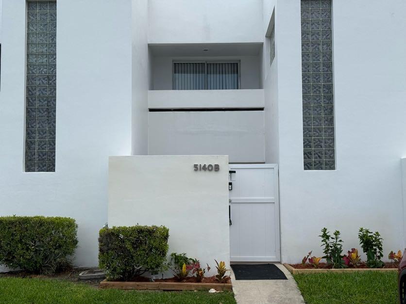 Photo of 5140 ELMHURST Road #B, West Palm Beach, FL 33417 (MLS # B26055499)