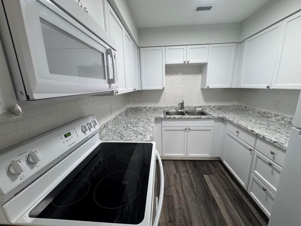 Photo of 243 Castelwood Drive #5, North Palm Beach, FL 33408 (MLS # R11064130)