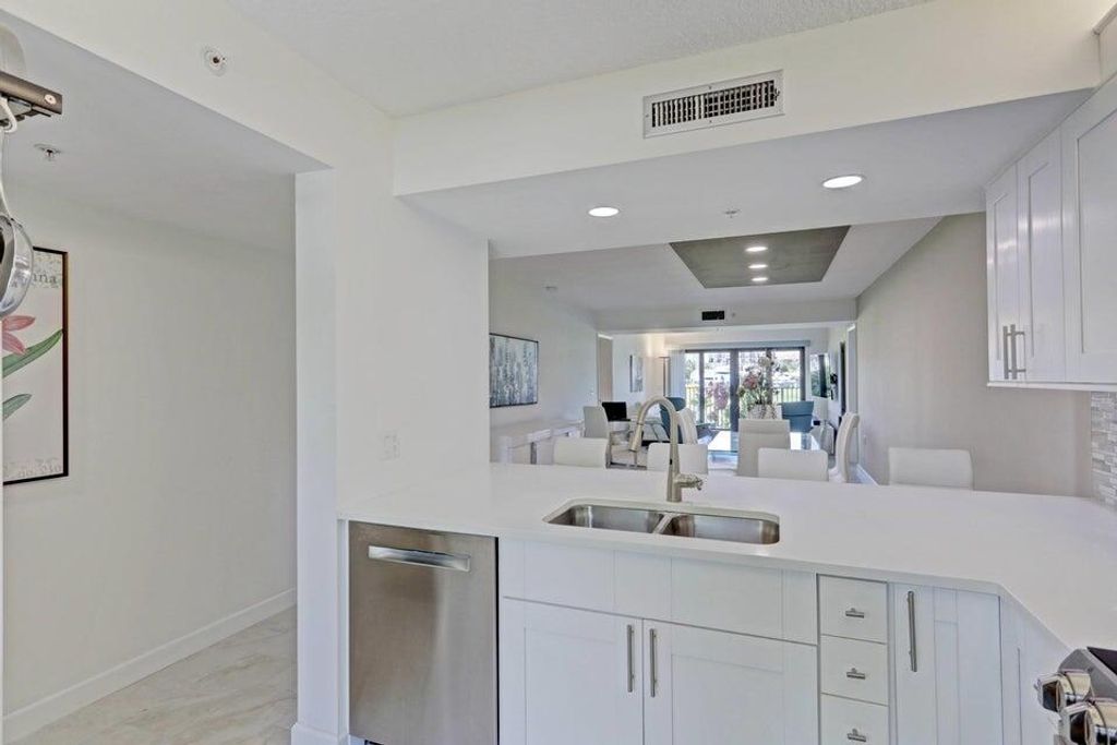 Photo of 901 Seafarer Circle #105, Jupiter, FL 33477 (MLS # R11062552)