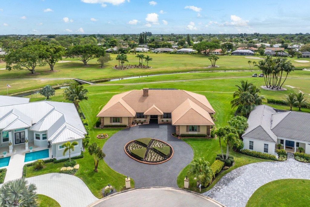 Photo of 427 Glenbrook Drive, Atlantis, FL 33462 (MLS # R10973051)