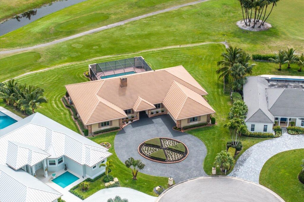 Photo of 427 Glenbrook Drive, Atlantis, FL 33462 (MLS # R10973051)