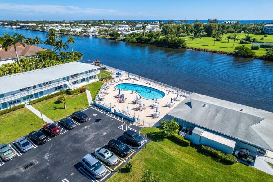 Affordable WATERFRONT living. THIS NEWLY LISTED & RARELY available 2-bedroom, 2-bath residence is located in the desired community of Hampshire Gardens. This unit is just steps from the Intracoastal and the updated, waterfront pool, offering beautiful water views and refreshing ocean breezes. Enjoy watching boats pass by, with easy access to the meditation and fishing dock, and nearby Jaycee Park, which is ideal for daily walks and outdoor enjoyment. The home features a bright, cozy layout, a new roof (2025), A/C (2025), water heater (2024), electric panel, accordion shutters, and a freshly painted exterior. Well-maintained, with spacious bedrooms and generous living areas, this home is ideal for full-time or seasonal living. Hampshire Gardens has completed extensive upgrades, including a new metal roofs (2025), fresh exterior paint, decorative railings, a newer seawall, and a fully renovated clubhouse (all paid by the current Seller). Residents enjoy a heated, saltwater pool located directly on the Intracoastal Waterway, with stunning views of The Little Club luxury golf course, lush landscaping, and an active 55+ lifestyle featuring social events. Maintenance includes water, sewer, trash, insurance, and more. Minutes to the beach, downtown Boynton, Delray dining and nightlife, shopping, and parks.