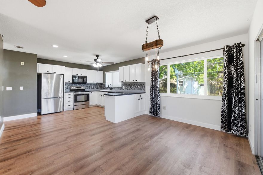 Welcome to 1313 Ethel Circle — a move-in ready home with the space, updates, and lifestyle today's families are looking for.  Situated on nearly 1/3 acre, this charming 3-bedroom, 2-bathroom home offers room to grow, play, entertain, and make lasting memories. Inside, you'll find a bright, freshly painted interior that feels clean, welcoming, and ready for your style. Big-ticket updates like a 2022 roof and brand-new electrical panel give buyers added confidence and peace of mind from day one. Built for Florida living, the home also features hurricane impact windows, offering both protection and improved energy efficiency. The vinyl flooring throughout is perfect for busy households with kids or pets, giving you durability and easy maintenance without sacrificing style.    The kitchen includes a reverse osmosis water filtration system installed under the sink, giving you clean, high-quality drinking water right at home — a small upgrade that makes a big difference. Step outside and enjoy one of the home's best features: a fully fenced backyard with plenty of space for kids to play, pets to run, family BBQs, or future outdoor upgrades. Two additional storage sheds provide excellent extra space — and one even has electric already connected, making it perfect for a workshop, hobby space, or additional storage. The screened-in porch is the perfect place to enjoy your morning coffee, relax after work, or unwind on the weekend. Conveniently located in the heart of Palm Bay, you're just minutes from shopping, dining, schools, and everyday essentials — plus quick access to I-95, making commuting simple and stress-free. Highlights include:     City water & sewer     No HOA     Large lot with functional outdoor space     Move-in ready with valuable upgrades     Reverse osmosis water system     Shed with electric + extra storage  If you've been searching for an affordable, updated home with space to grow and commute with ease, 1313 Ethel Circle is one you won't want to miss.