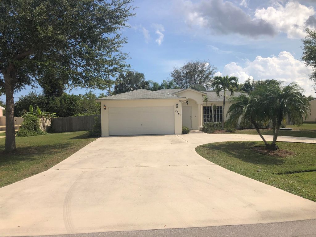 Photo of 2261 SE Merrill Road Rd, Port St Lucie, FL 34952 (MLS # R10784978)