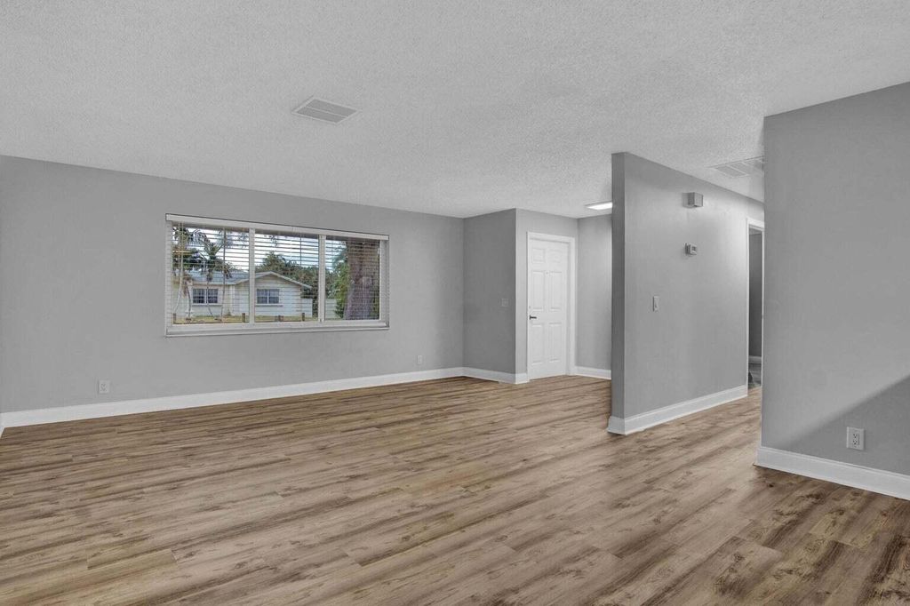 Photo of 3170 Melaleuca Drive, West Palm Beach, FL 33406 (MLS # R11049425)