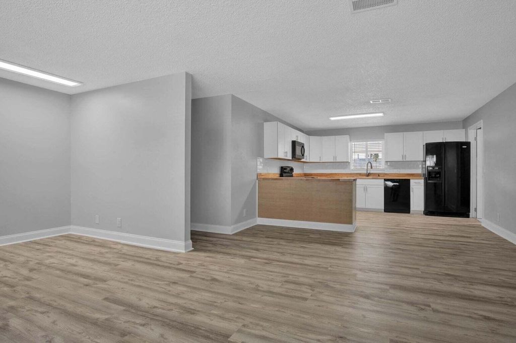 Photo of 3170 Melaleuca Drive, West Palm Beach, FL 33406 (MLS # R11049425)