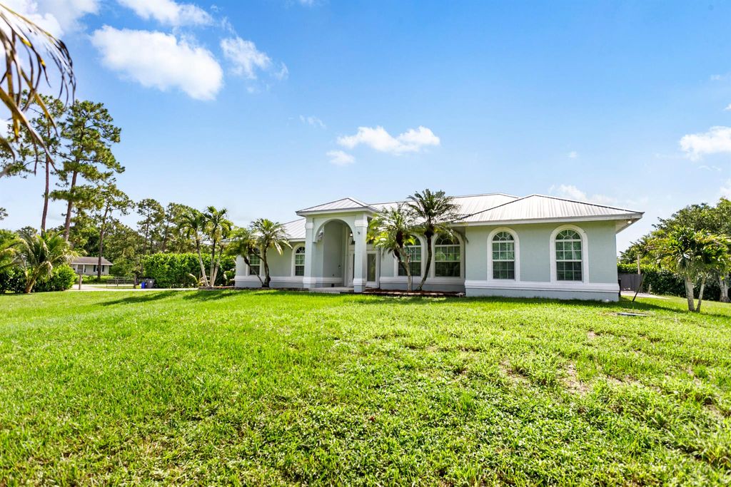 Photo of 4518 180th Avenue N, The Acreage, FL 33470 (MLS # R11103606)