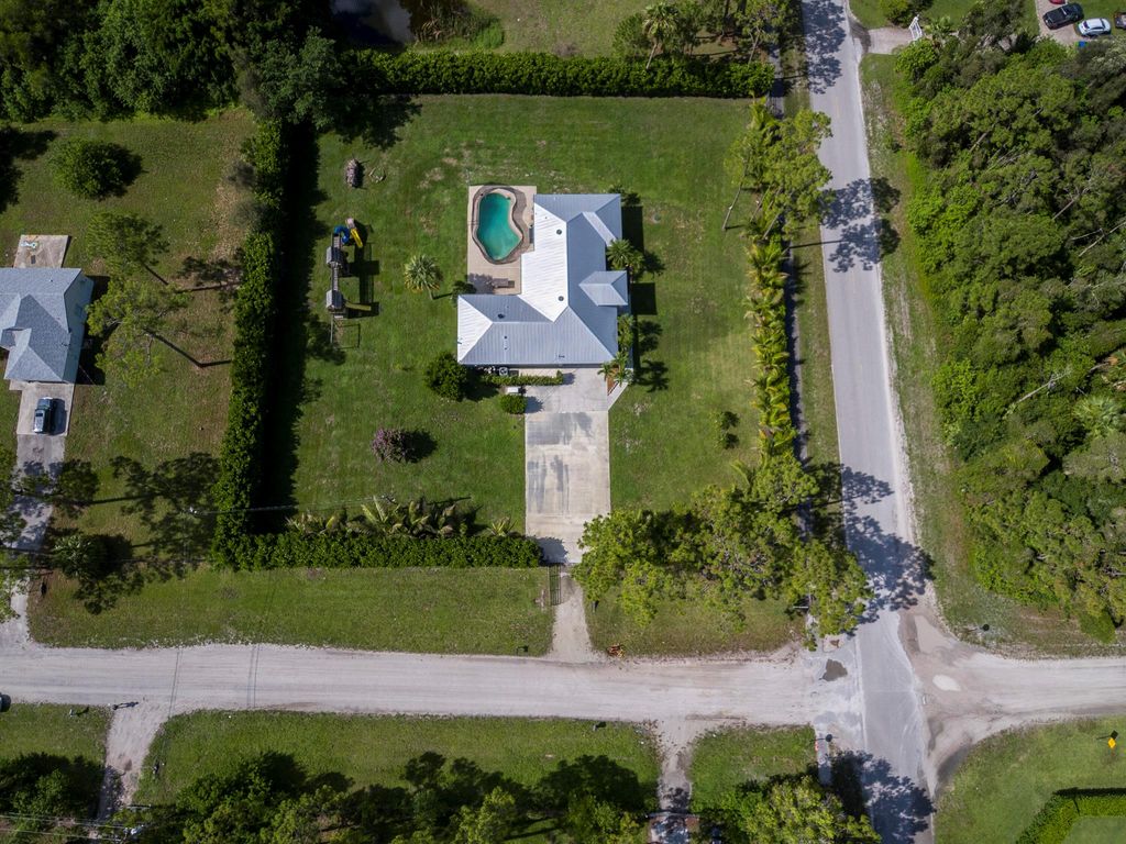 Photo of 4518 180th Avenue N, The Acreage, FL 33470 (MLS # R11103606)