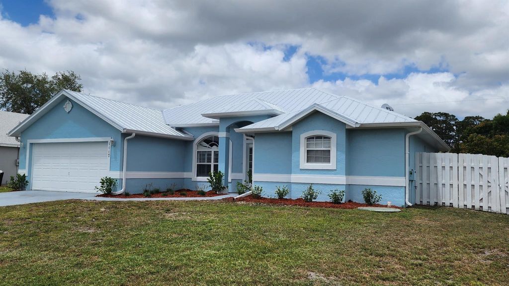 Photo of 1117 SW Sudder Avenue, Port Saint Lucie, FL 34953 (MLS # R11052494)