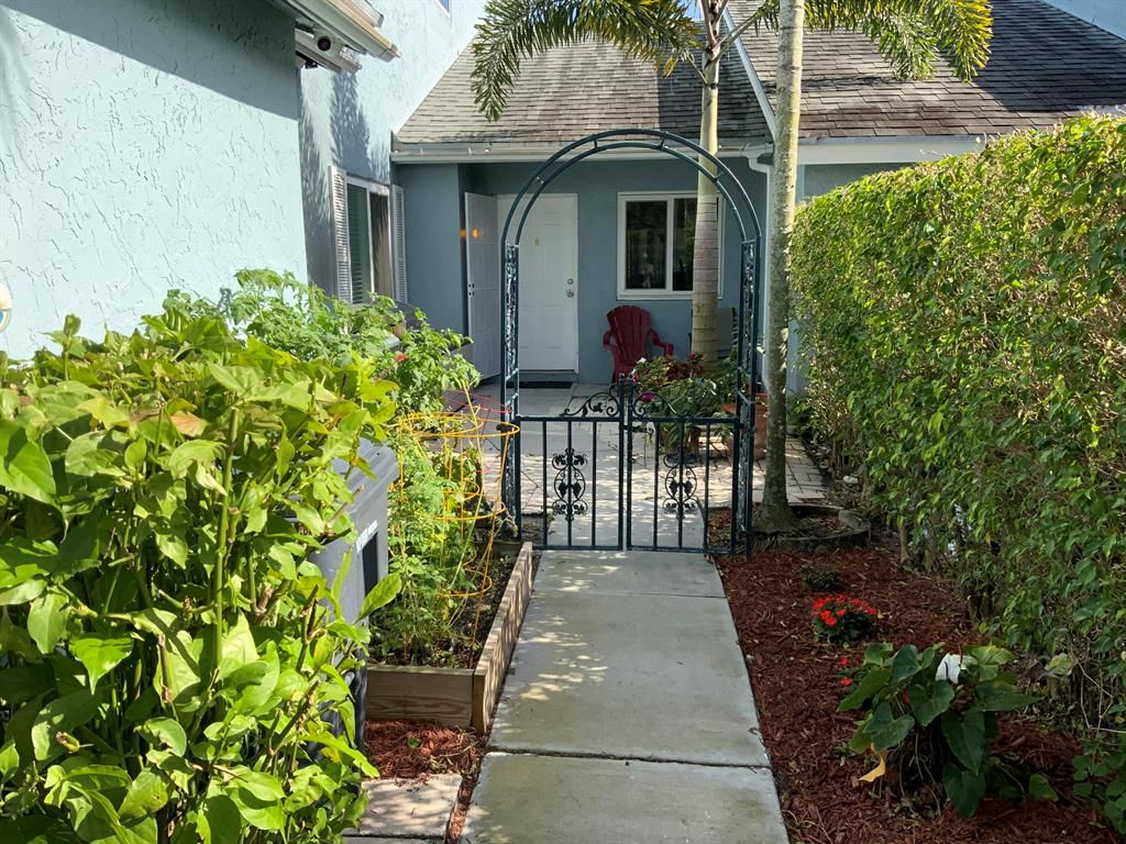 Photo of 3789 Island Club Circle Cir E, Lake Worth Beach, FL 33462 (MLS # R10794763)