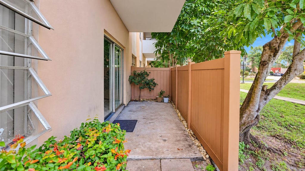 Photo of 4174 Inverrary Drive #103, Lauderhill, FL 33319 (MLS # B26080597)