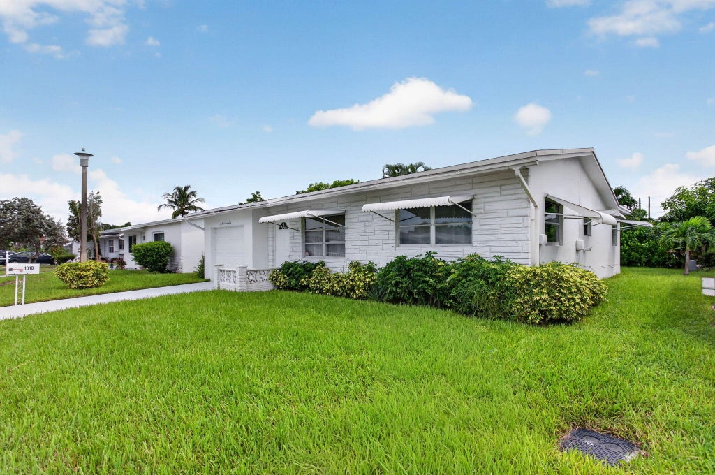 Photo of 1010 NW 72ND Terrace, Margate, FL 33063 (MLS # B26080765)
