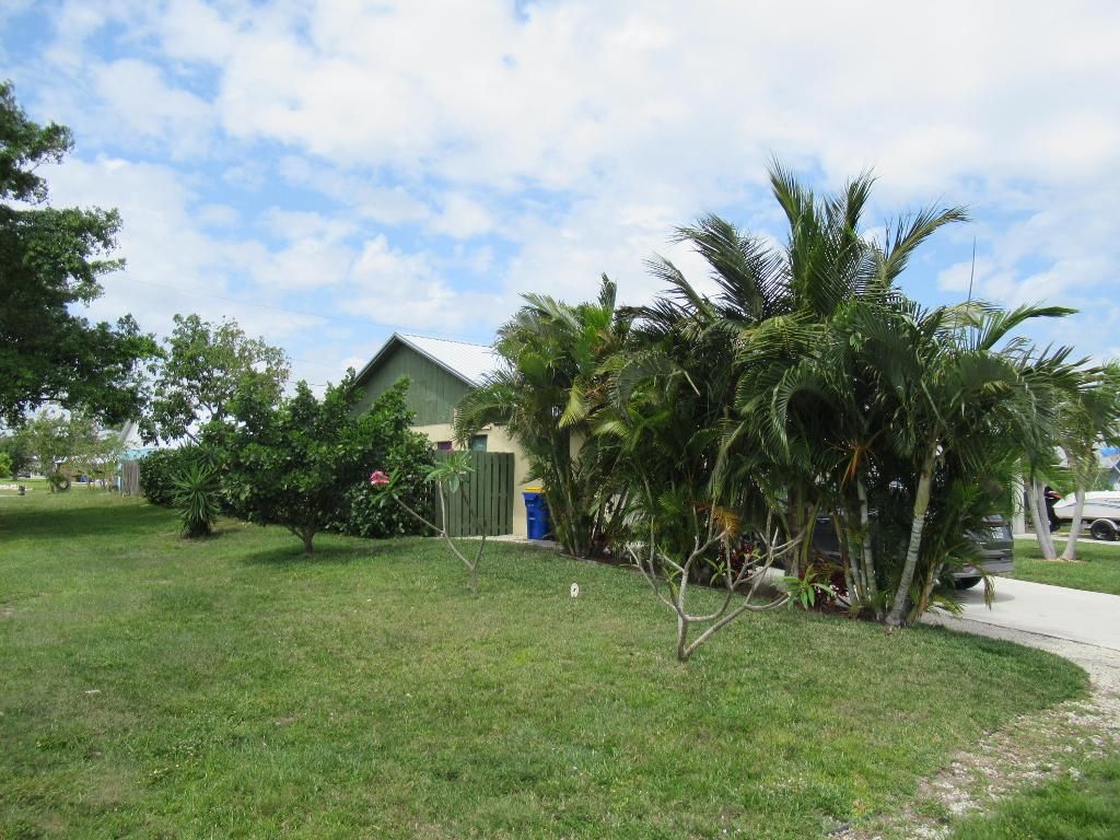 Photo of 5832 SE Collins Avenue, Stuart, FL 34997 (MLS # R11084708)