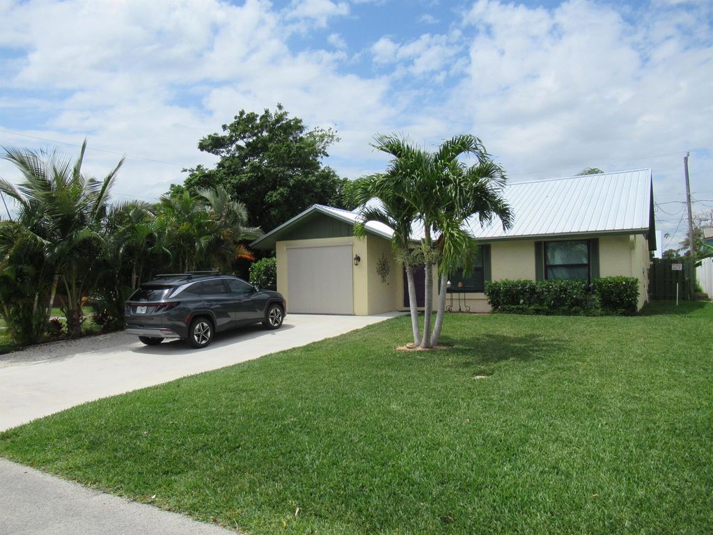 Photo of 5832 SE Collins Avenue, Stuart, FL 34997 (MLS # R11084708)
