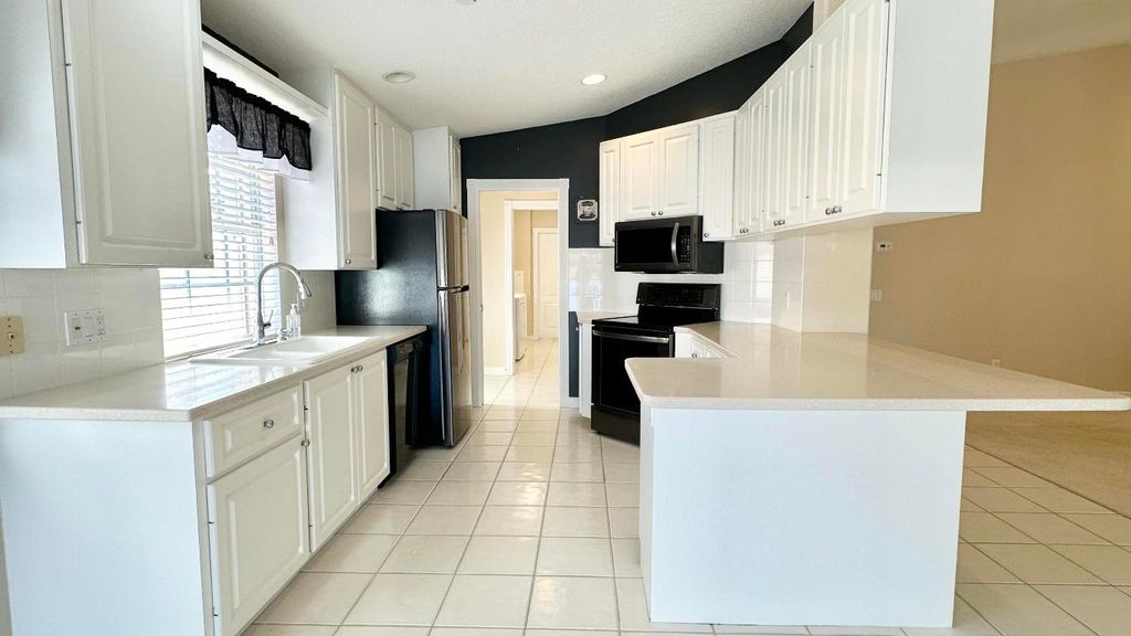 Photo of 2216 Blue Springs Road, West Palm Beach, FL 33411 (MLS # R10964816)
