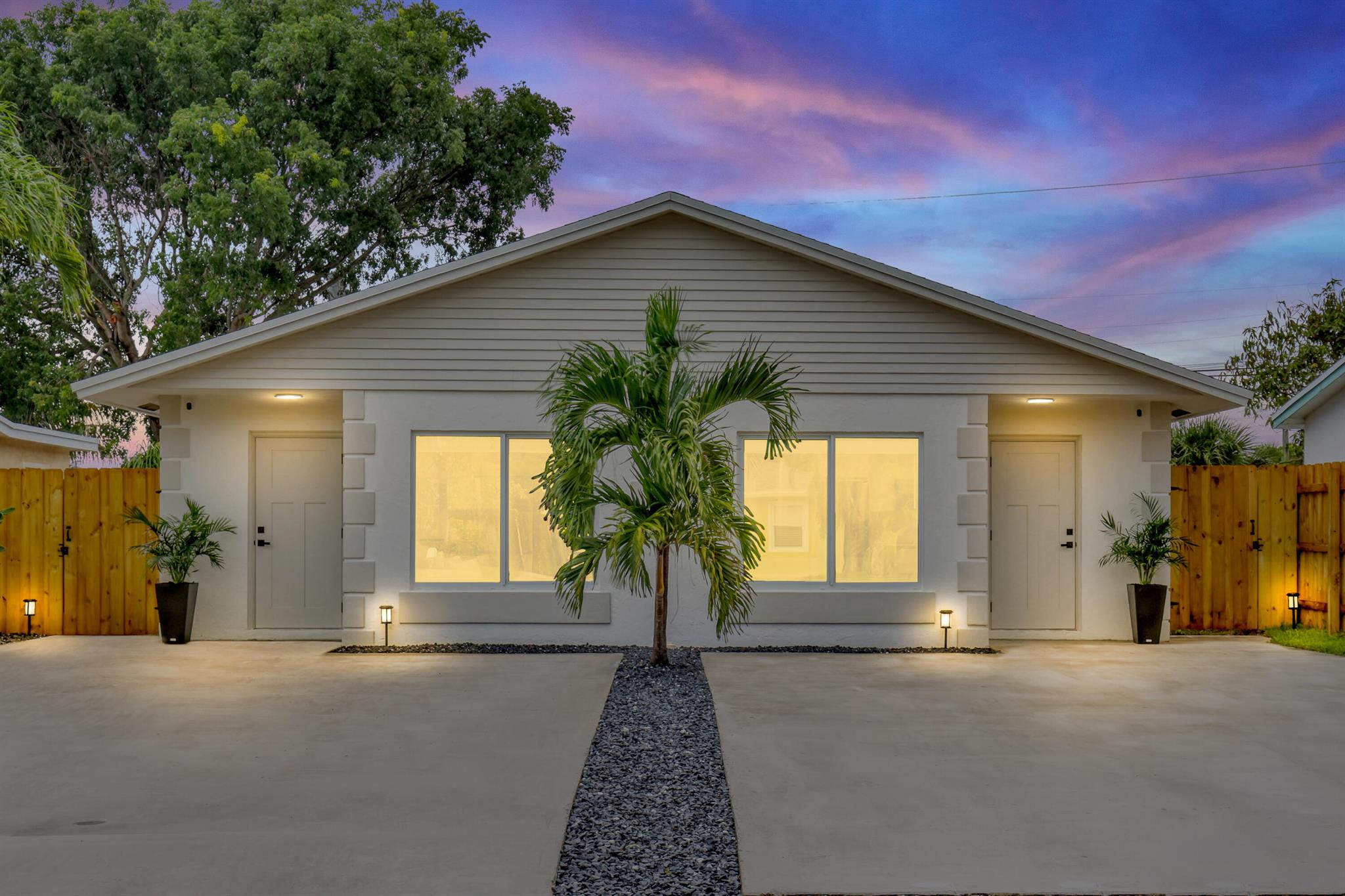 Immaculate Fully Renovated Duplex - Ideal for Airbnb, Investment, or Owner-Occupancy (Live in One Side & Rent Out the Other) 1,729 S.F. Under Air | 1,785 S.F. Under Roof Exceptional opportunity to own a beautifully renovated, owner-occupied duplex near the heart of Downtown Lantana. Just a short walk to Ocean Avenue, the Intracoastal Waterway, and less than 1 mile to stunning Lantana Beach. Each side of this CBS-constructed duplex features 2 bedrooms, 1 bath, private fenced backyards, and fully upgraded interiors -- Perfect for Airbnb Rentals or Long-Term Tenants. With separate electric and water meters, as well as individual washers and dryers, this property offers versatility and strong investment potential.