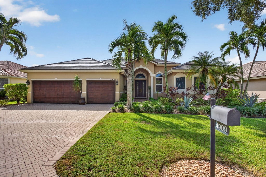 Photo of 4909 NW 112th Drive, Coral Springs, FL 33076 (MLS # B26067898)
