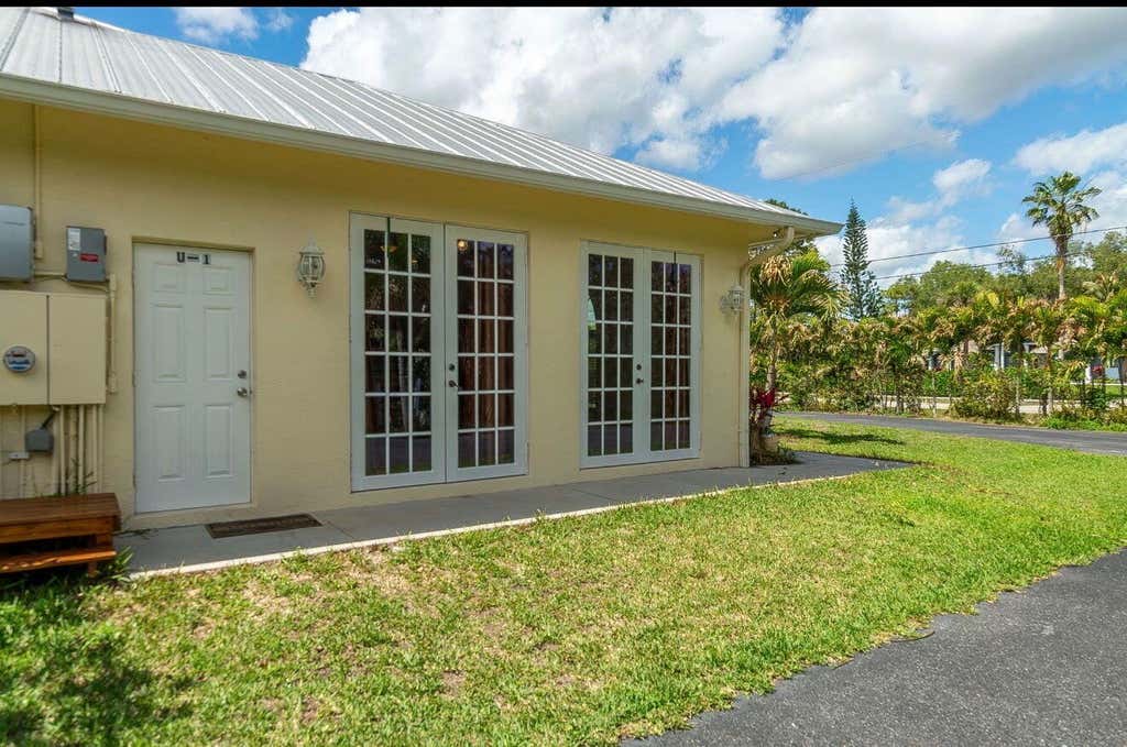 Photo of 12094 Citrus Grove Boulevard, West Palm Beach, FL 33412 (MLS # B26028238)
