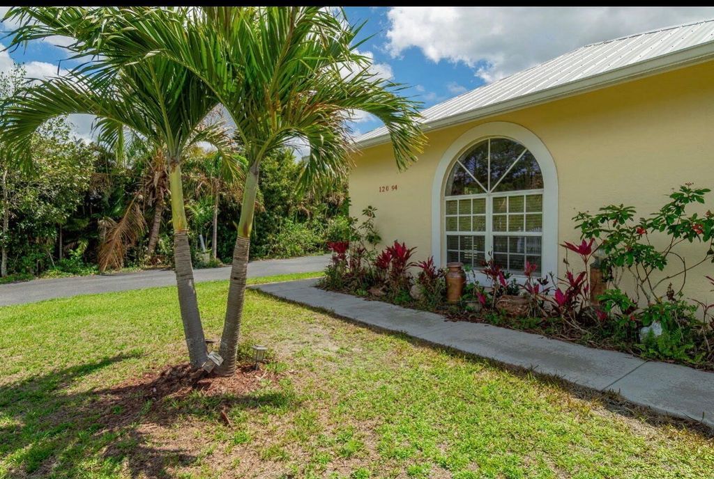 Photo of 12094 Citrus Grove Boulevard, West Palm Beach, FL 33412 (MLS # B26028238)