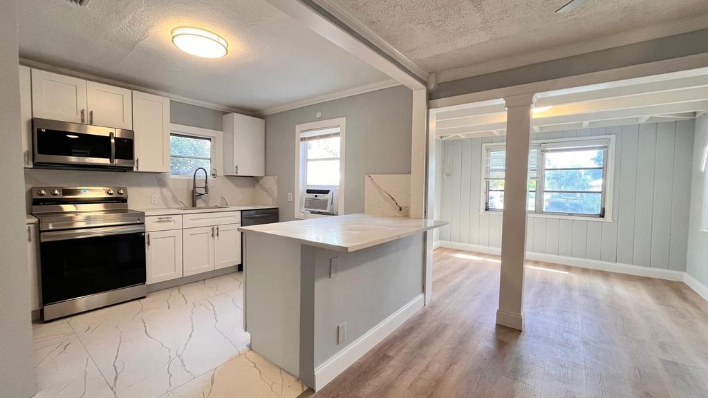 Photo of 712 Tuscaloosa Street, West Palm Beach, FL 33405 (MLS # B26016136)
