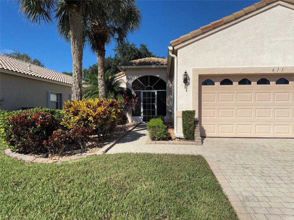 Photo of 611 NW Whitfield Way, Port Saint Lucie, FL 34986 (MLS # F10485195)